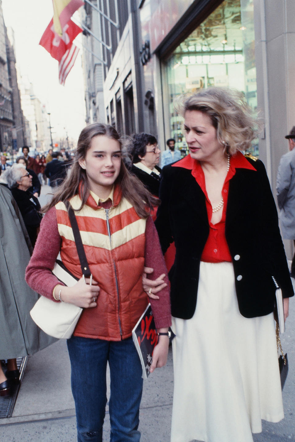 Brooke Shields and her mother (and manager) Teri Shields (1933 - 2012) walk together, New York, New York, 1978