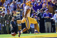 LSU running back Tyrion Davis-Price (3) scores a touchdown against Florida in the second half of an NCAA college football game in Baton Rouge, La., Saturday, Oct. 16, 2021. (AP Photo/Matthew Hinton)