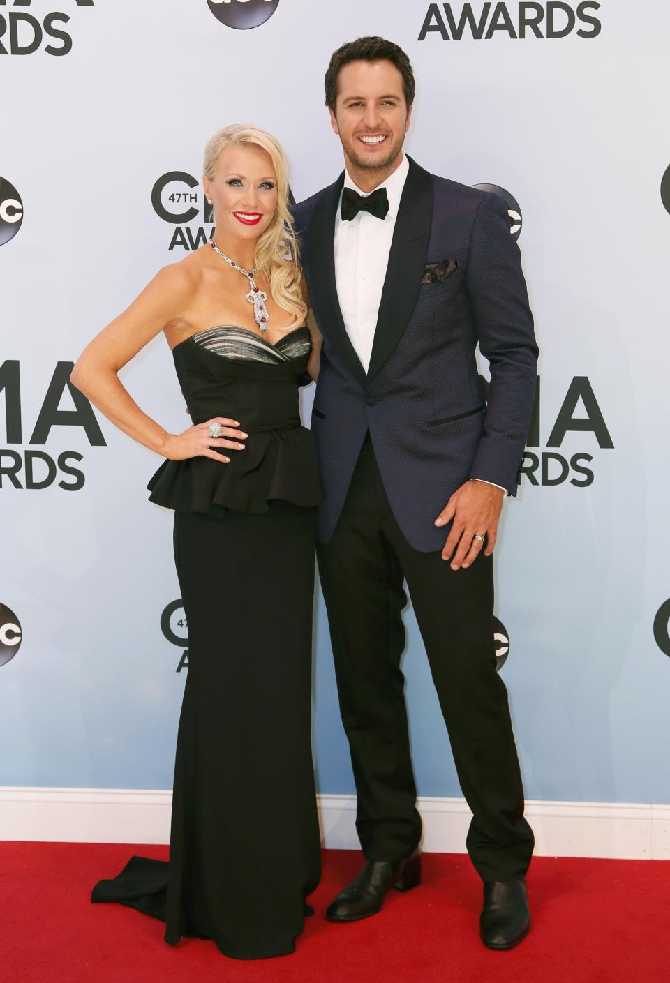 Luke Bryan and his wife Caroline Boyer pose on arrival at the 47th Country Music Association Awards in Nashville