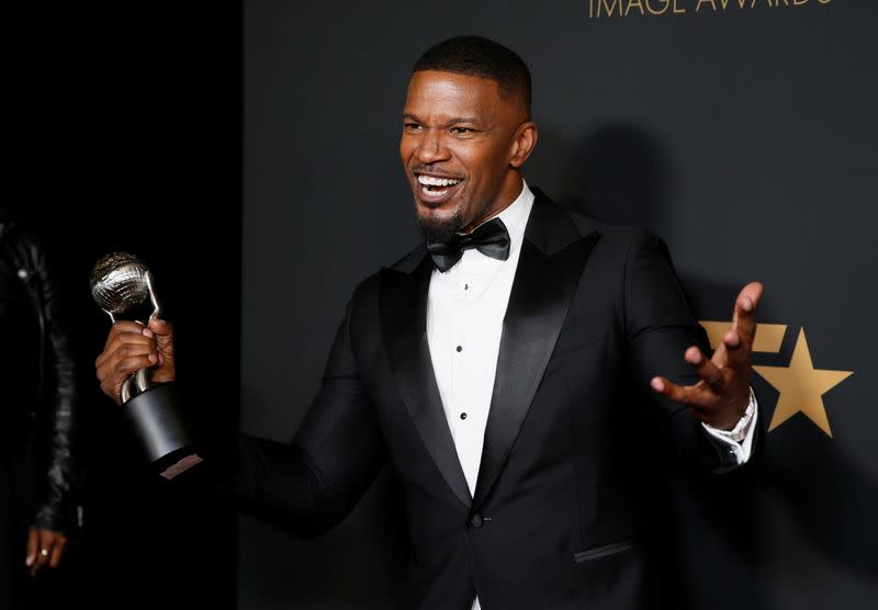 FILE PHOTO: 51st NAACP Image Awards – Photo Room– Pasadena - Jamie Foxx poses backstage with his Outstanding Supporting Actor in a Motion Picture award for "Just Mercy\