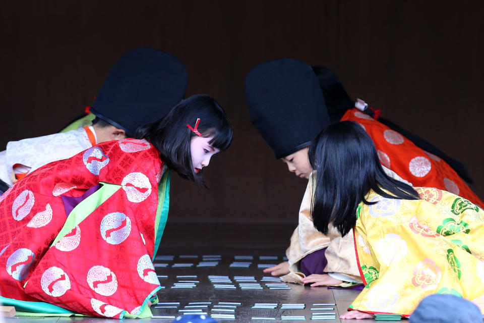 Karuta card game play as New Year event