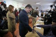 Leader of Macedonian ruling party VMRO-DPMNE and former Prime Minister Nikola Gruevski arrives with his wife Borkica to cast his vote during elections in Skopje, Macedonia, December 11, 2016. REUTERS/Ognen Teofilovski