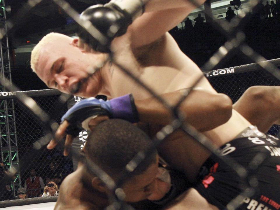 <p>File Image: Tyler East of Albuquerque, top , pounds on Prince McLean of Cincinnati, Ohio in the Heavy weight 265 lbs. match during the MMA Fight Pit Genesis on Saturday, 13 August 2011</p> (Albuquerque Journal/ Zumapress)