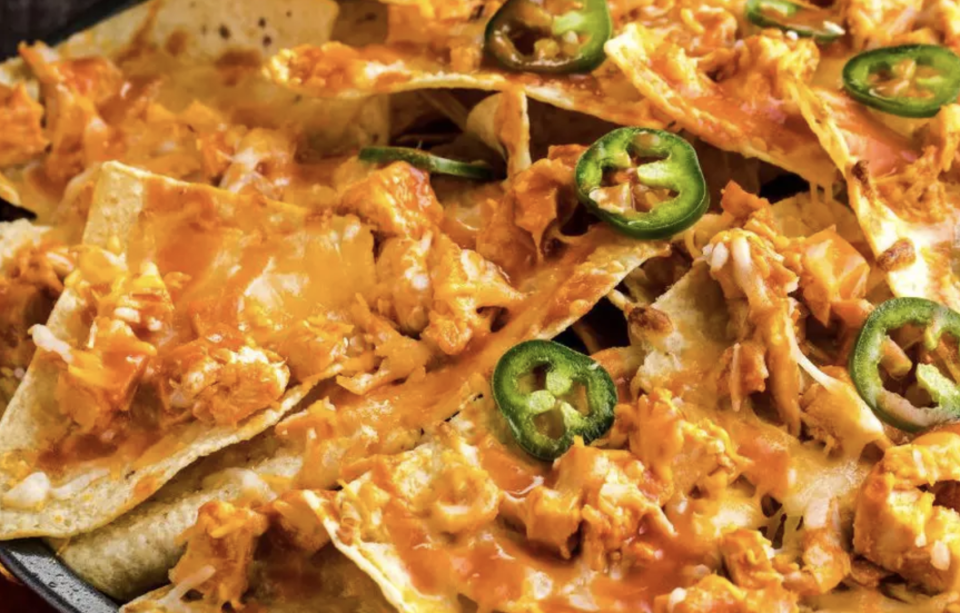 <p>These Buffalo chicken nachos will make every day feel like game day. With shredded chicken, tortilla chips, cheese and hot sauce, you need only 15 minutes to make these. </p> <p><a href="https://www.thedailymeal.com/recipes/frank-s-redhot-buffalo-chicken-nachos-recipe?referrer=yahoo&category=beauty_food&include_utm=1&utm_medium=referral&utm_source=yahoo&utm_campaign=feed" rel="nofollow noopener" target="_blank" data-ylk="slk:For the Frank's RedHot Buffalo Chicken Nachos recipe, click here;elm:context_link;itc:0;sec:content-canvas" class="link ">For the Frank's RedHot Buffalo Chicken Nachos recipe, click here</a>.</p>