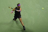 Rafael Nadal, of Spain, returns a shot to Matteo Berrettini, of Italy, during the men's singles semifinals of the U.S. Open tennis championships Friday, Sept. 6, 2019, in New York. (AP Photo/Sarah Stier)