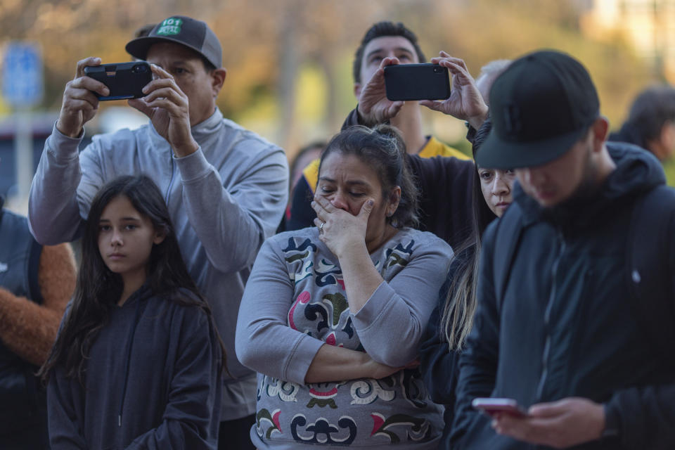 NEWBURY PARK, CA - JANUARY 26: People mourn at a makeshift memorial at Mamba Sports Academy for former NBA great Kobe Bryant, who was killed in a helicopter crash while commuting to the academy on January 26, 2020 in Newbury Park, California. Nine people have been confirmed dead in the crash in Calabasas, among them Bryant and his 13-year-old daughter Gianna. (Photo by David McNew/Getty Images)