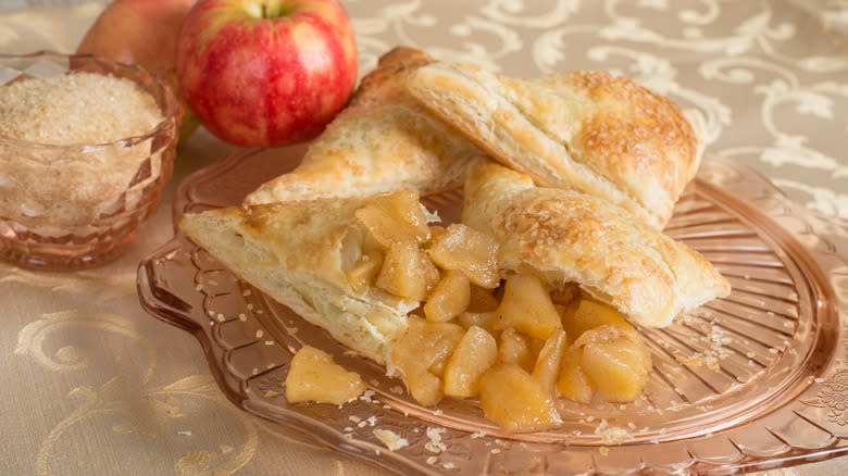 Apple turnovers on glass plate