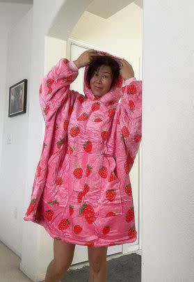 An oversized strawberry blanket hoodie