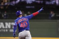 Chicago Cubs' Willson Contreras celebrates after hitting a two-run home run during the eighth inning of a baseball game against the Milwaukee Brewers Tuesday, April 13, 2021, in Milwaukee. (AP Photo/Morry Gash)