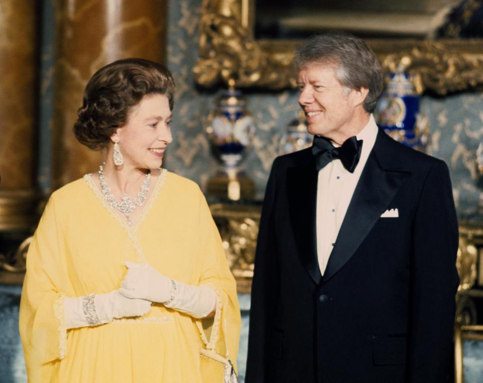 The Queen and Jimmy Carter in 1977 (PA)