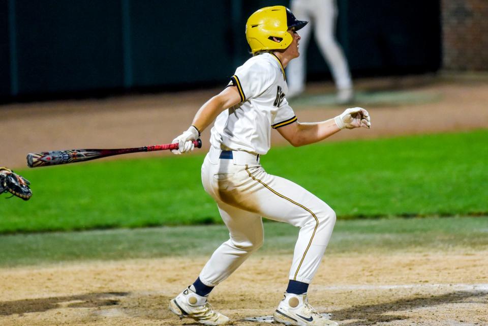Grand Ledge's Carter Melnik drives in two runs against St. Johns during the fifth inning on Wednesday, May 31, 2023, at McLane Stadium on the Michigan State campus in East Lansing.