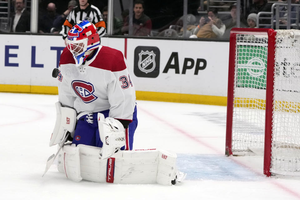 Montreal Canadiens goaltender Jake Allen stops a shot on goal during the second period of an NHL hockey game against the Los Angeles Kings Thursday, March 2, 2023, in Los Angeles. (AP Photo/Marcio Jose Sanchez)