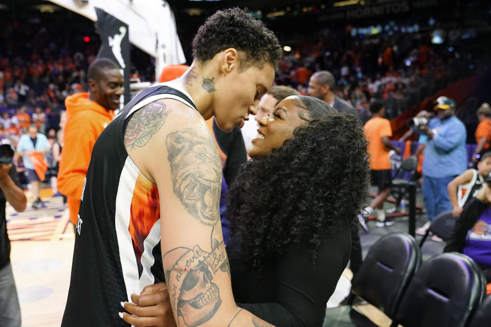 Phoenix Mercury center Brittney Griner greets her wife, Cherelle, after the Mercury&#39;s home opener on May 21, 2023, at Footprint Center in Phoenix. (AP Photo/Ross D. Franklin)