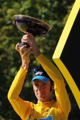 Bradley Wiggins, pictured on July 22, made a low-key return home Monday after his historic Tour de France win, even as Britain looked forward to the cyclist leading the country to more success at the London Olympics