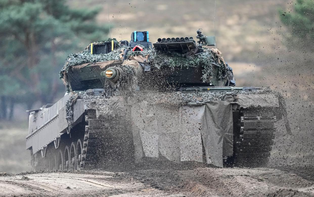 A Leopard 2 tank is seen in action during a visit of German Defense Minister Boris Pistorius (Copyright 2023 The Associated Press. All rights reserved.)