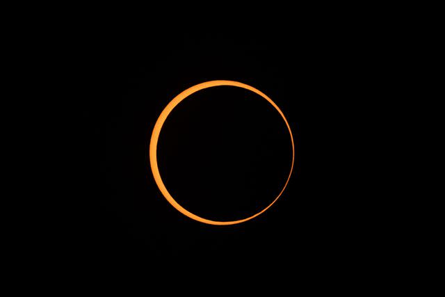 <p>Rick Kern/Getty</p> A "ring of fire" annular solar eclipse is seen in Boerne, Texas in October 2023.