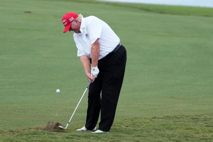 2022: Former President Donald Trump plays his shot from the rough on the 18th hole during the Pro-Am Tournament before the LIV Golf Series at Trump National Doral.