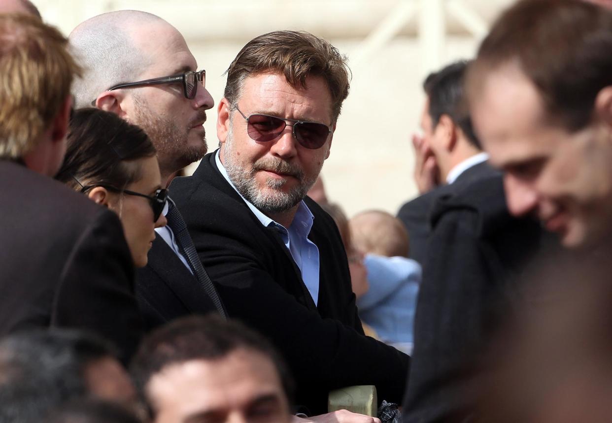 Russell Crowe and Darren Aronofsky at Pope Francis' weekly audience in St. Peter's Square on Mar. 19 (Franco Origlia/Getty Images)