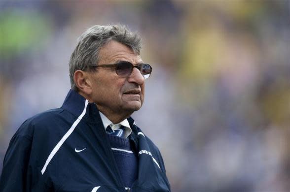 Penn State head coach Joe Paterno watches his team during the fourth quarter of the Capital One Bowl NCAA football game in Orlando, Florida