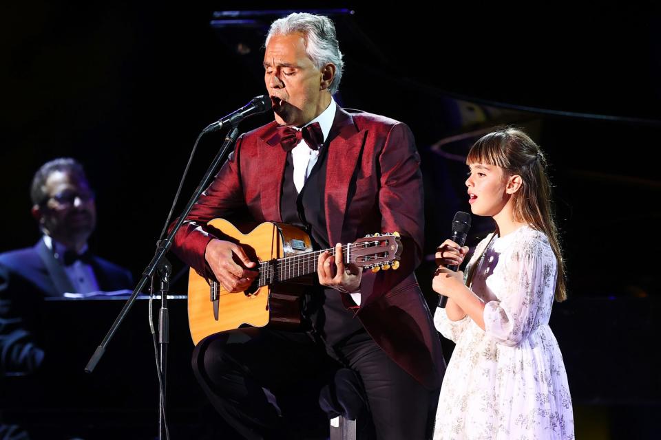<p>Andrea Bocelli is joined onstage by his daughter Virginia during a performance in Tabuk, Saudi Arabia on Thursday.</p>