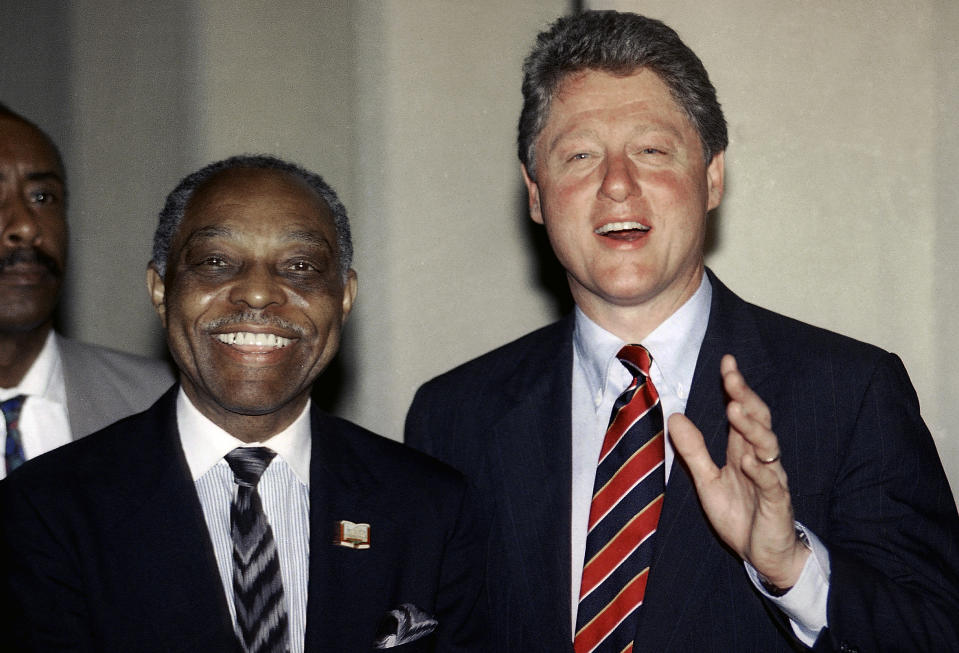 FILE - Bill Clinton speaks as he is joined by The Rev. Cecil Murray of First A.M.E. during a news conference at the First A.M.E. Church in Los Angeles, Sunday, May 3, 1992. Murray, an influential pastor and civil rights leader who gained international attention for his efforts to help Los Angeles recover from one of the country's worst race riots, died Friday, April 5, 2024. He was 94. (AP Photo/Douglas C. Pizac, File)