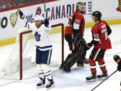 Toronto Maple Leafs right wing William Nylander (88) celebrates a goal in front of Ottawa Senators goaltender Marcus Hogberg (35) and defenseman Thomas Chabot (72) during second-period NHL hockey game action in Ottawa, Ontario, Saturday, Feb. 15, 2020. (Justin Tang/The Canadian Press via AP)