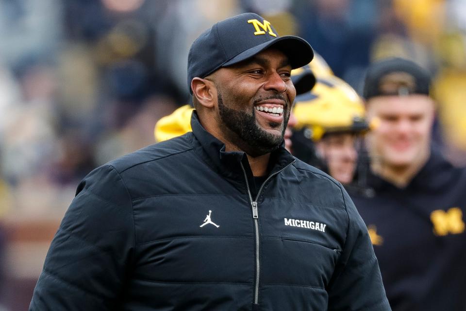 Michigan head coach Sherrone Moore watches warm up during the spring game at Michigan Stadium in Ann Arbor on Saturday, April 20, 2024.