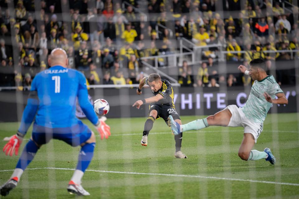 Nov 12, 2023; Columbus, Ohio, USA;
Columbus Crew midfielder Alexandru Măţan (20) scores their third goal against Atlanta United during game three of their series on Sunday, Nov. 12, 2023 at Lower.com Field.