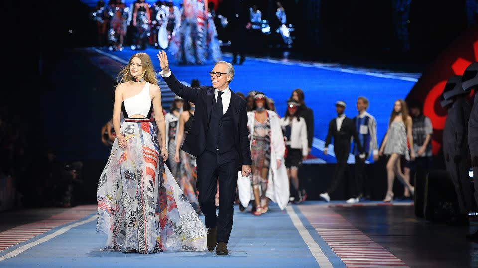 Gigi Hadid and Tommy Hilfiger walk the runway at the Tommy Hilfiger's Fall-Winter 2018 show during Milan Fashion Week on February 25, 2018. - Daniele Venturelli/WireImage/Getty Images