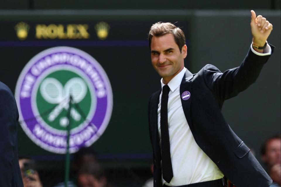 Roger Federer returned for the ceremony. (AFP via Getty Images)