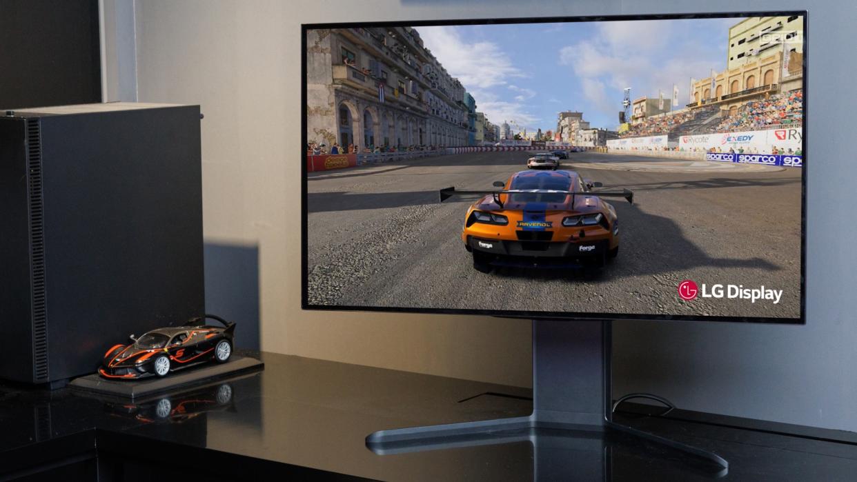  LG Display new OLED panel with racing game on screen. 