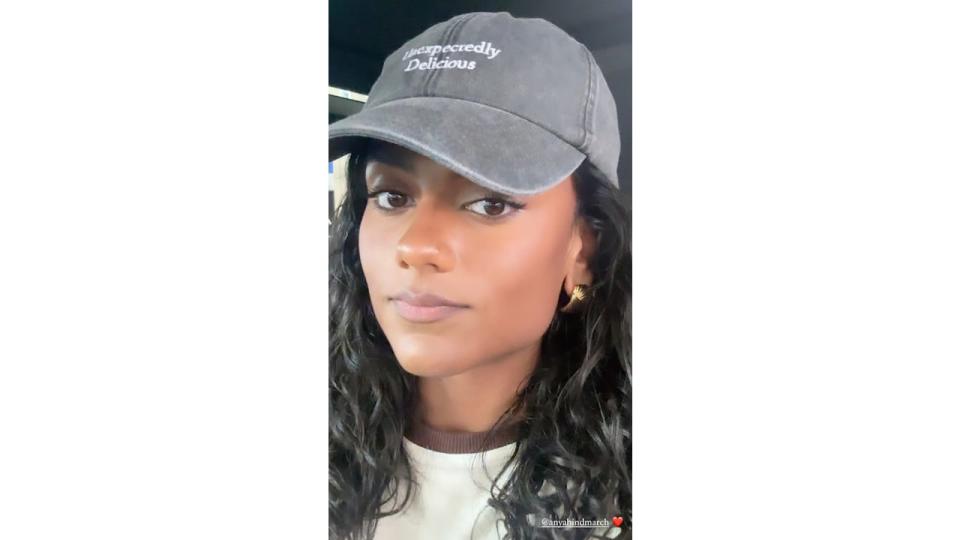 Simone wore a slogan cap from Anya Hindmarch