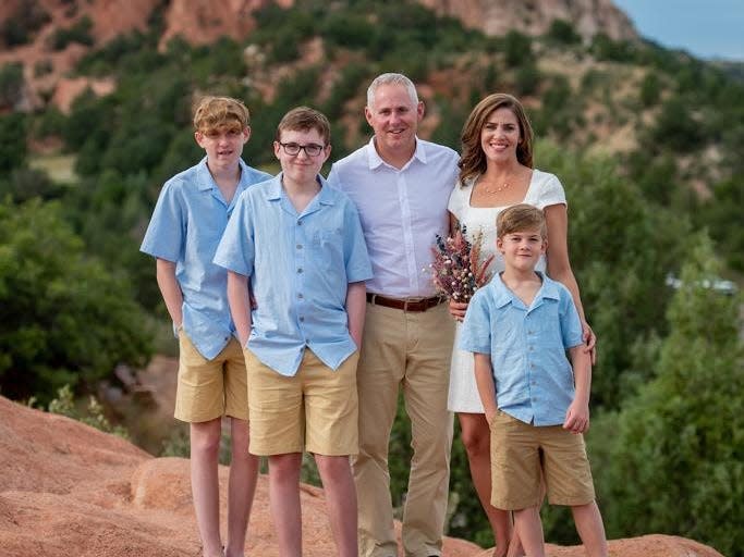 Family posing for a picture at the Garden of the Gods skate park