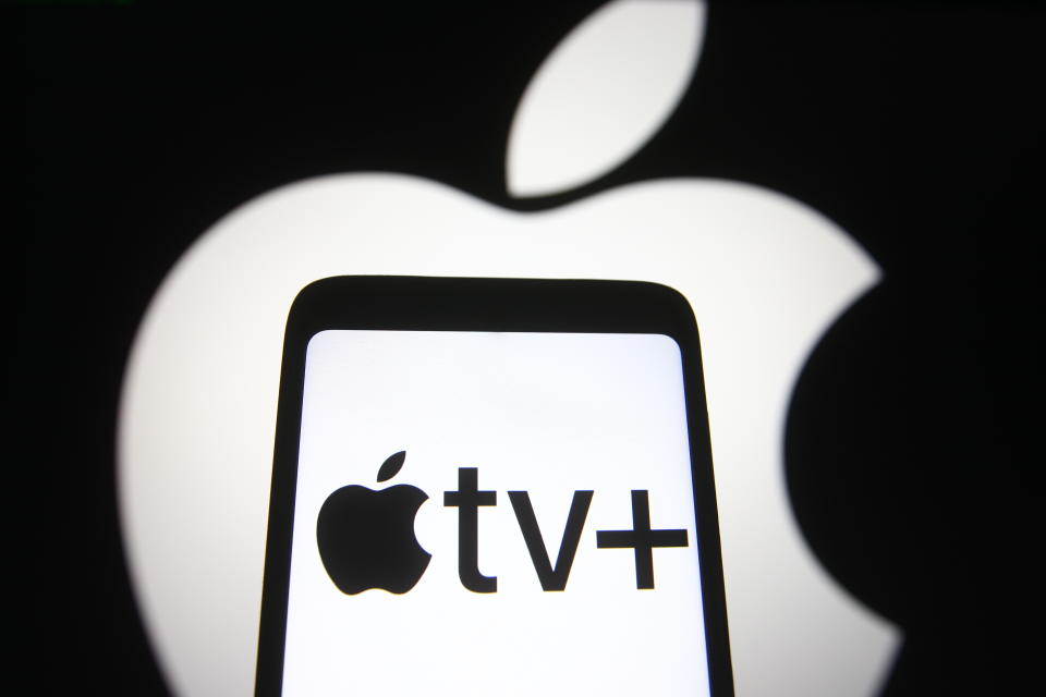 UKRAINE - 2021/04/19: In this photo illustration an Apple TV+ logo is seen on a smartphone screen with an Apple logo in the background. (Photo Illustration by Pavlo Gonchar/SOPA Images/LightRocket via Getty Images)