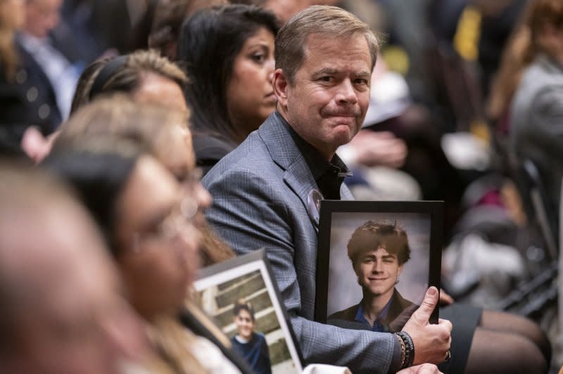 An audience participant expresses emotion during a Senate Judiciary Committee hearing on social media at the U.S. Capitol in Washington, D.C., on Wednesday. Photo by Ken Cedeno/UPI