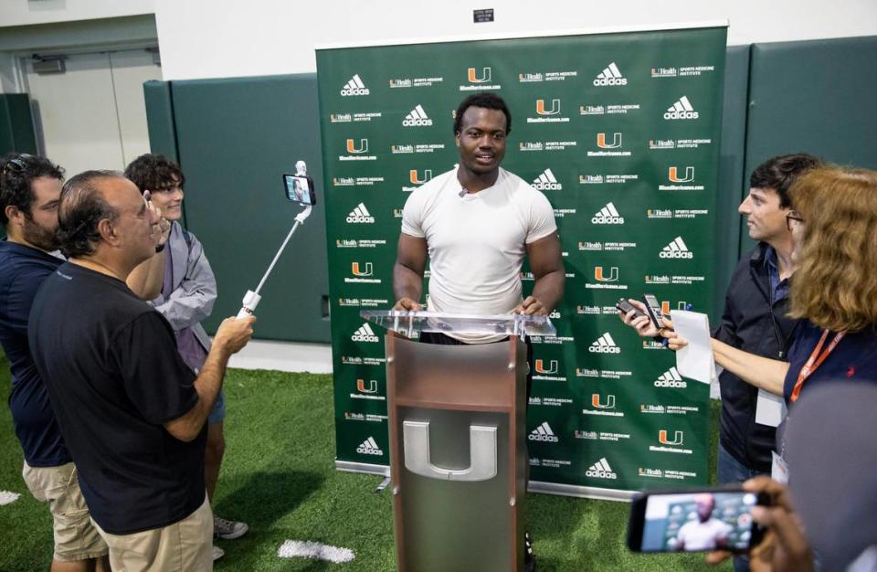 Miami Hurricanes defensive line Rueben Bain talks to reporters after participating in a spring football practice session at the University of Miami’s Greentree Field on Tuesday, April 11, 2023, in Coral Gables, Fla.