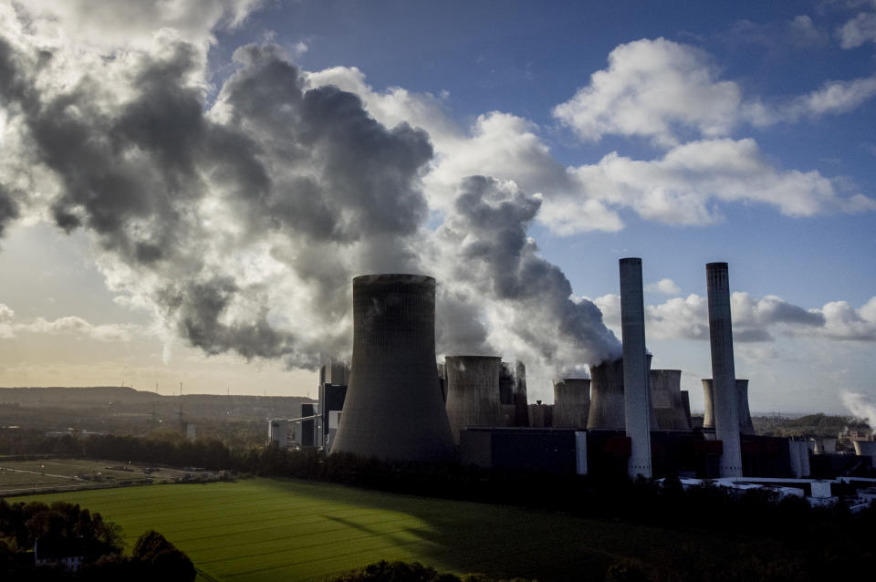 Steam rises from the coal-fired power plant Niederaussem, Germany, Nov. 2, 2022. Once the world had hope that when nations got together they could stop climate change. Thirty years after leaders around the globe first got together to try, that hope has melted. (AP Photo/Michael Probst)