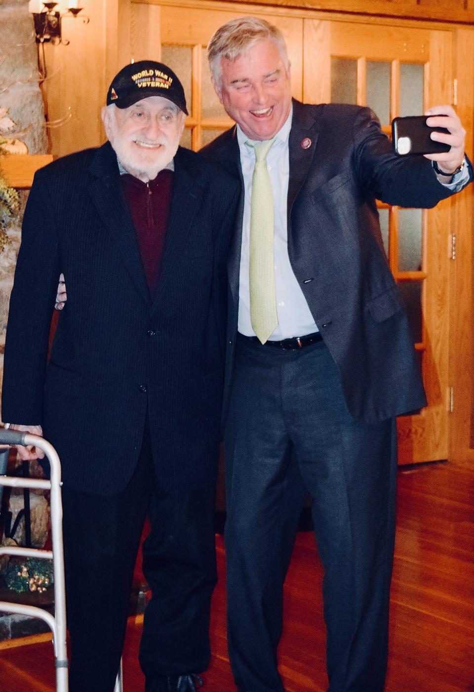 U.S. Rep. David Trone, D-6th, right, snaps a selfie with Ritchie Boy Gideon Kantor on Monday after announcing legislation nominating the Ritchie Boys for a Congressional Gold Medal.