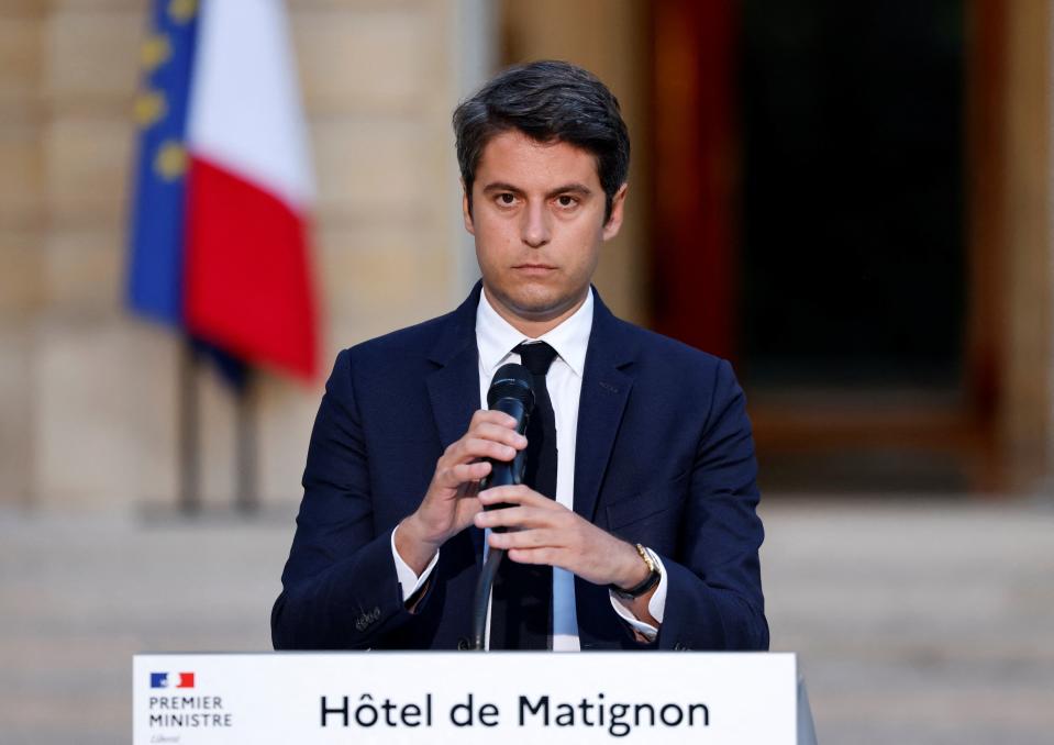 France’s prime minister Gabriel Attal prepares to deliver a speech following the first results of the second round of France’s legislative election at Hotel Matignon in Paris on 7 July 2024 (AFP via Getty Images)