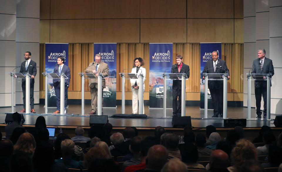 Akron's mayoral candidates before a debate April 12 at the Akron-Summit County Public Library.