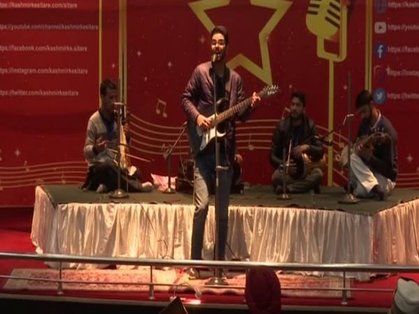 Kashmiri artists performing at the event organised by JKLI in Srinagar on Saturday. (Photo/ANI)