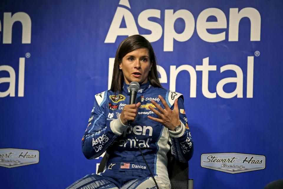 FILE - In this Sept. 18, 2015, file photo, Danica Patrick talks to media at a news conference before her practice for the NASCAR Sprint Cup Series auto race at Chicagoland Speedway, in Joliet, Ill. One of Patrick's sponsors has stepped up to fill a sudden funding void created when Stewart-Haas Racing sued her primary backer for $31 million in a breach of contract suit. Aspen Dental said Tuesday, Feb. 14, 2017, it will be the lead sponsor for Patrick and debut on her car in the Feb. 26 season-opening Daytona 500. (AP Photo/Nam Y. Huh, File)