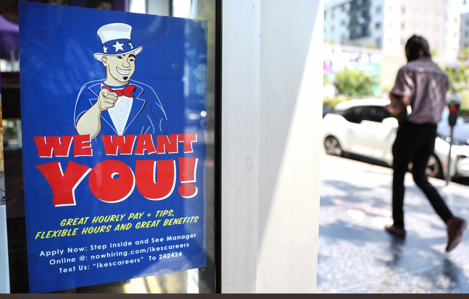 LOS ANGELES, CALIFORNIA - JULY 26: A 'We Want You!' sign is posted at an Ike's Love &amp; Sandwiches store on July 26, 2022 in Los Angeles, California. As the Federal Reserve continues to increase interest rates, the labor market is starting to show signs of slowing down. (Photo by Mario Tama/Getty Images)