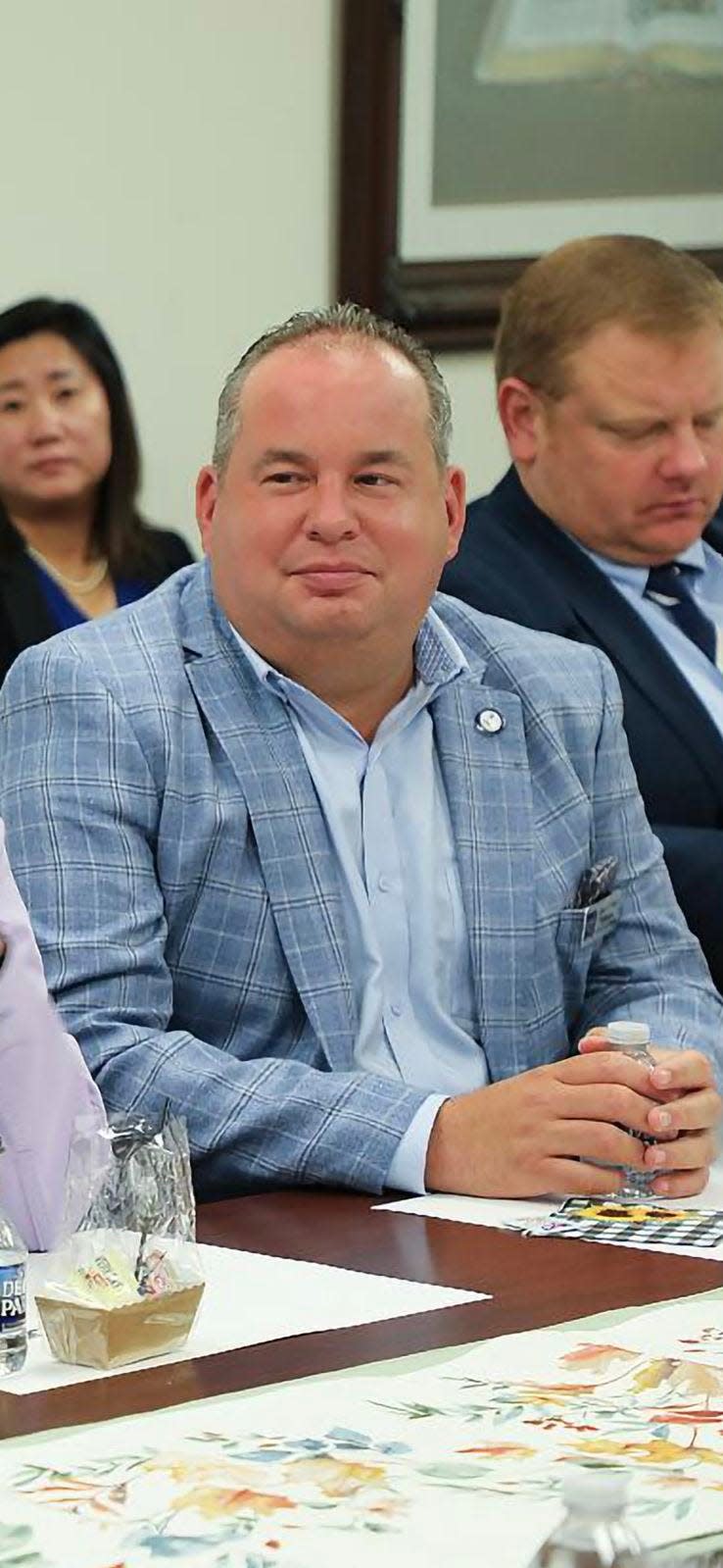 Republican candidate for Virginia House of Delegates District 8, Max Fisher, attends a meeting with church leadership at Korean Central Presbyterian Church in October 2023.