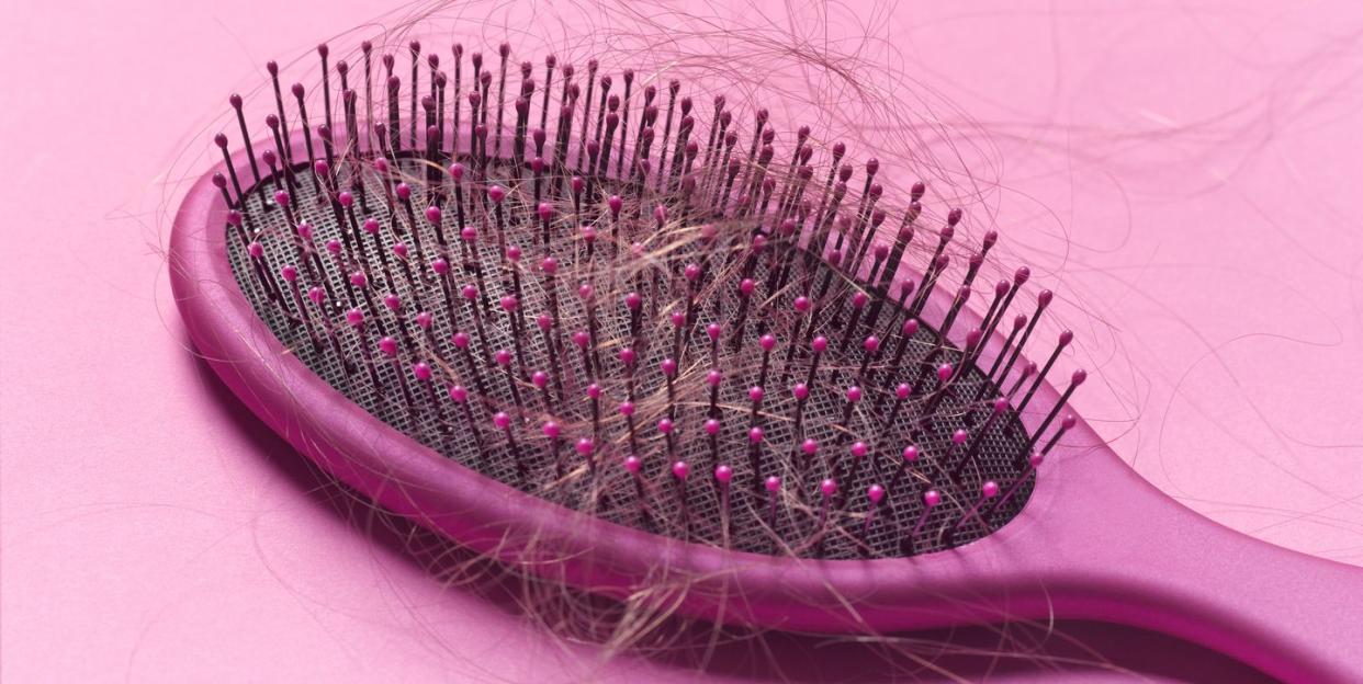 Hairbrush in need of cleaning. (Getty Images)