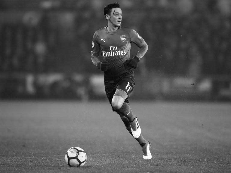 Many questions still hang over Arsenal, but Mesut Ozil's new contract answers a big one and halts their slide