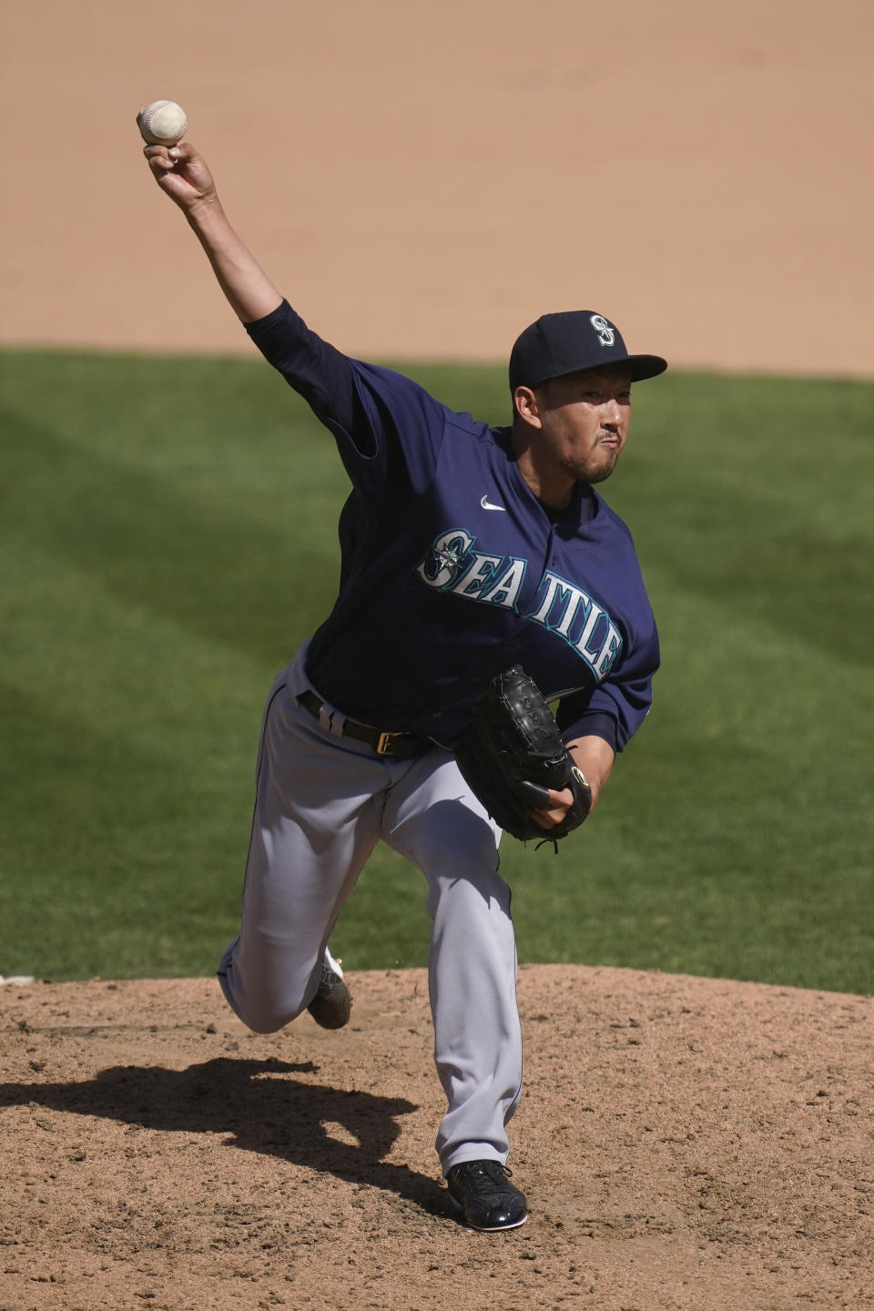 Seattle Mariners' Yoshihisa Hirano, from Japan, pitches against the Oakland Athletics during the seventh inning of a baseball game in Oakland, Calif., Sunday, Sept. 27, 2020. (AP Photo/Jeff Chiu)