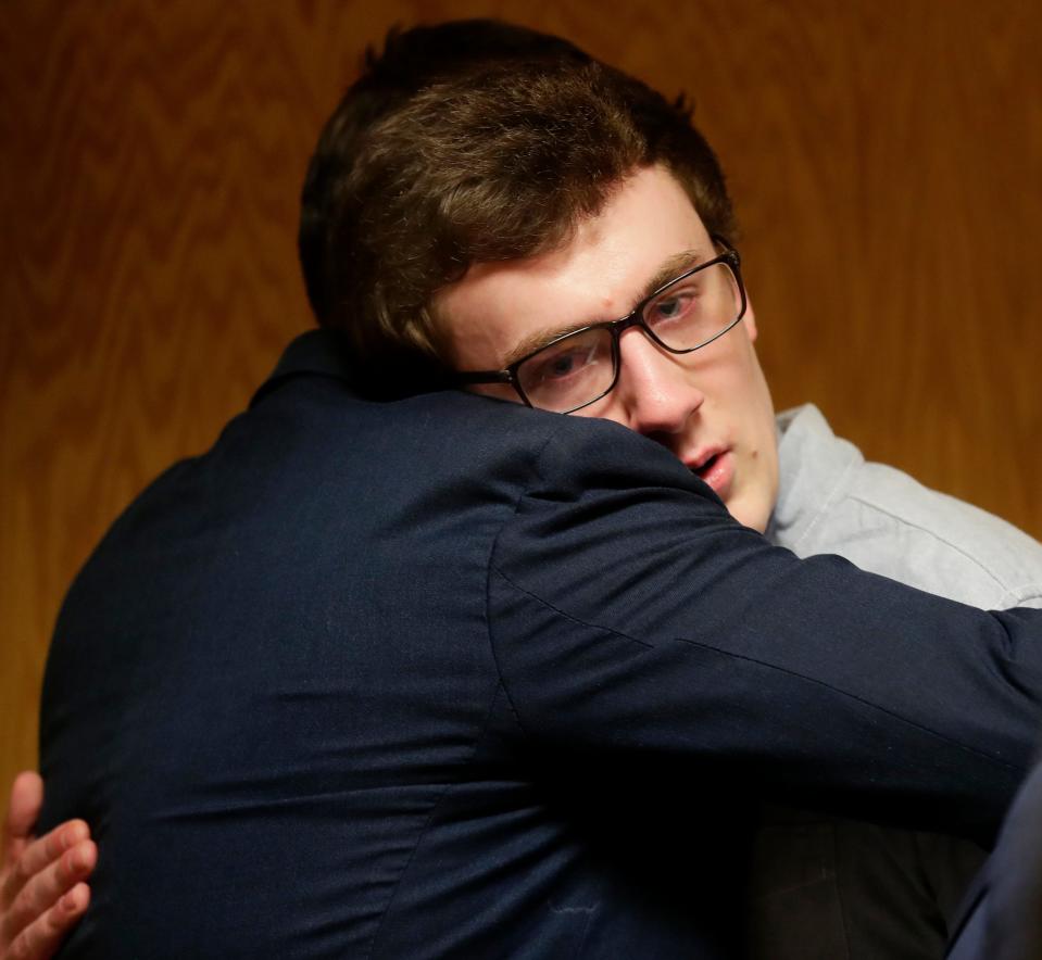 Grant Fuhrman reacts after being found guilty of attempted first-degree intentional homicide on Feb. 3, 2023, in the Branch 6 courtroom at the Winnebago County Courthouse in Oshkosh, Wis. Grant Fuhrman, 20, is charged with attempted first-degree intentional homicide for the 2019 stabbing of an Oshkosh West school resource officer. At the time of the incident, Fuhrman was a 16-year-old junior at Oshkosh West High School. He is accused of stabbing Officer Michael Wissink in the neck with a barbecue fork at the school on Dec. 3, 2019.