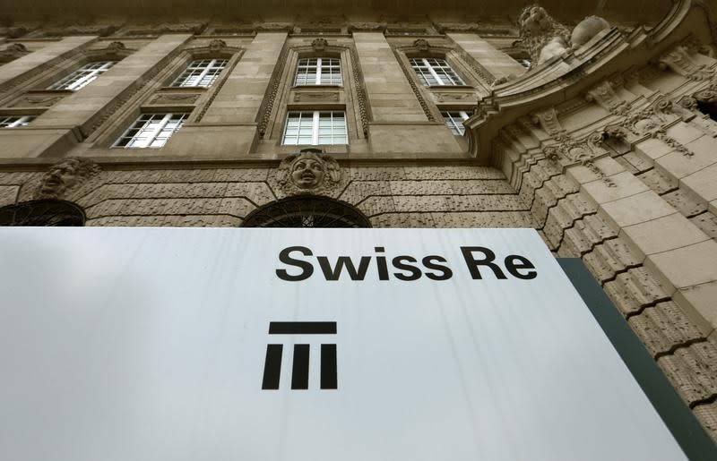 The logo of the world's second biggest reinsurer Swiss Re is seen in front of the company's headquarters in Zurich July 8, 2013. REUTERS/Arnd Wiegmann