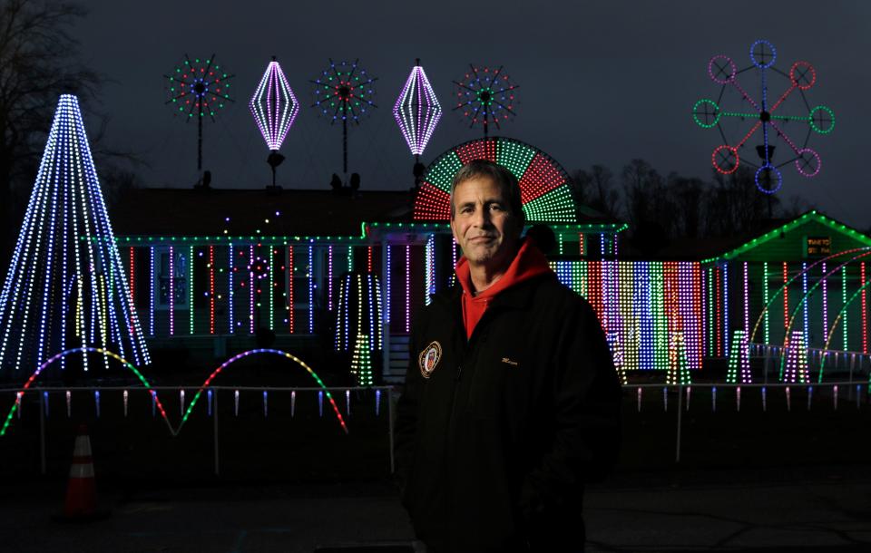Warwick Mayor Frank Picozzi with his Christmas light display.